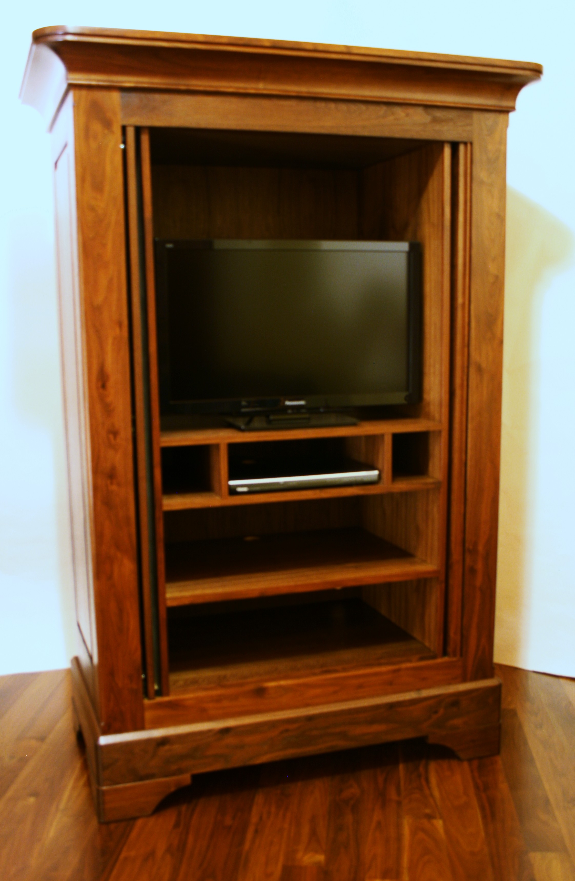 Interior of solid walnut armoire