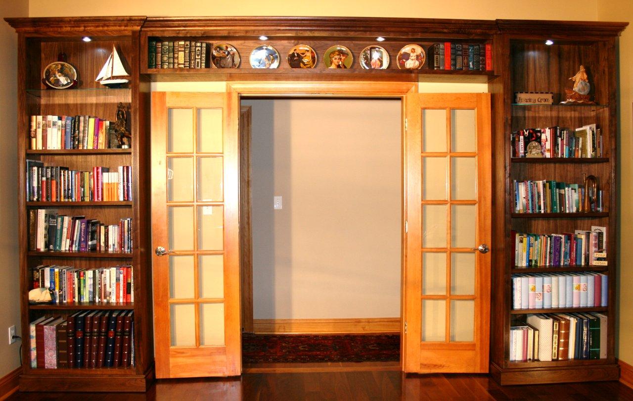 Walnut bookcases with bridge